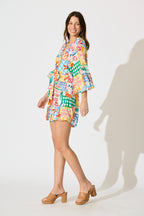 Otillie Playsuit in White Multi Conversational Print